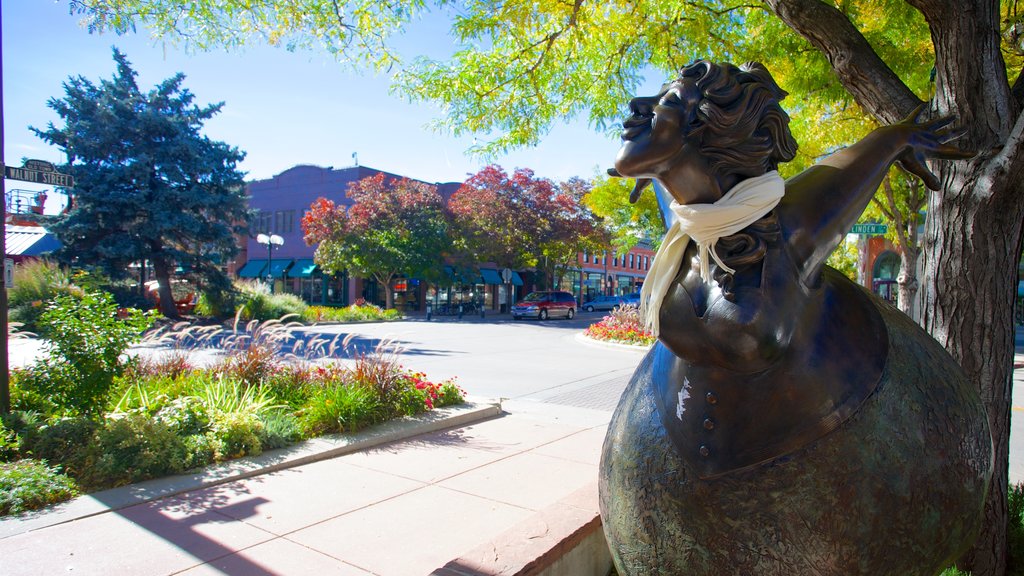 Fort Collins ofreciendo una estatua o escultura, arte al aire libre y un jardín