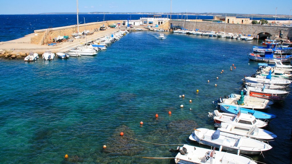 Lecce showing a marina and general coastal views