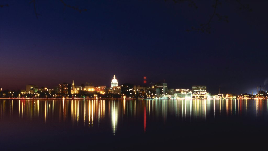 Madison showing skyline, a lake or waterhole and night scenes