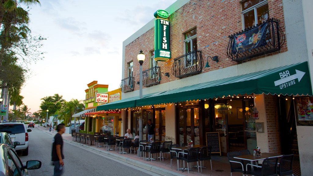 Clematis Street which includes street scenes, signage and a bar