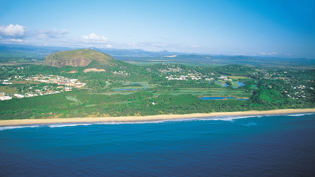 Coolum Beach which includes mountains, a sandy beach and landscape views