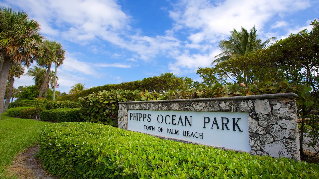 Phipps Ocean Park featuring signage and a garden