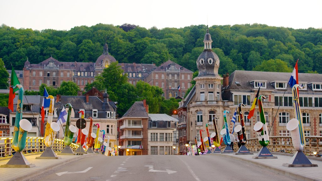 Dinant featuring street scenes, a small town or village and outdoor art