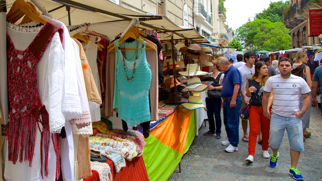 San Telmo which includes street scenes and markets as well as a large group of people