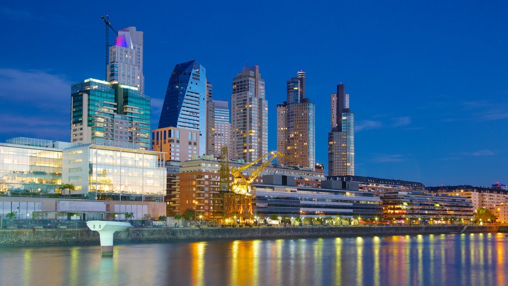 Puerto Madero featuring modern architecture, night scenes and skyline