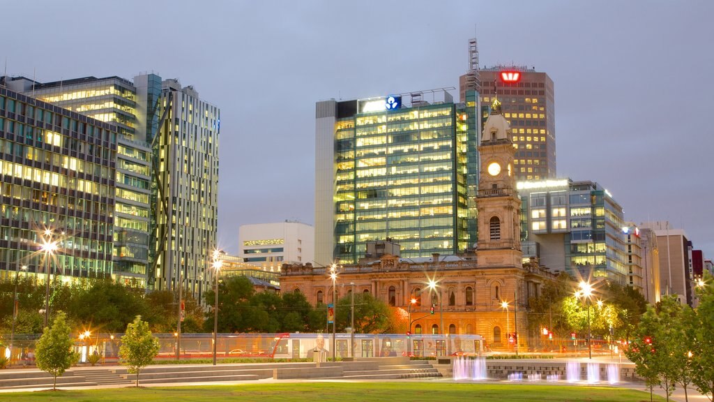 Victoria Square showing modern architecture, a fountain and night scenes