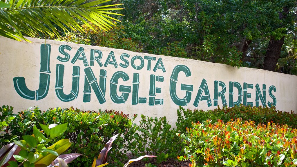 Sarasota Jungle Gardens which includes signage and a garden