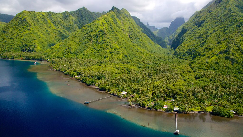 Tahiti featuring mountains and general coastal views