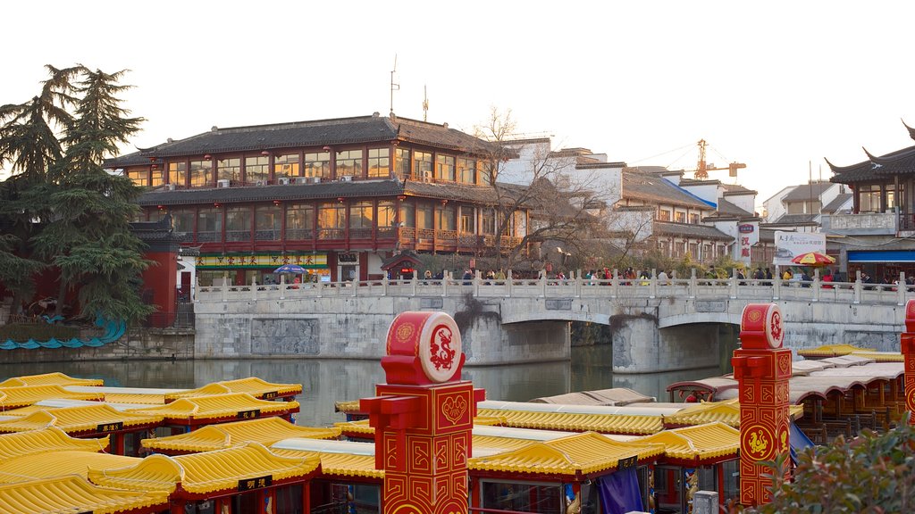 Temple of Confucius showing a city, a sunset and heritage architecture