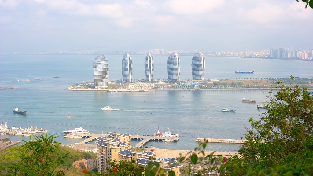 Luhuitou Park featuring a high-rise building and a bay or harbour