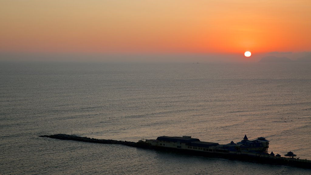 Lima showing a sunset and general coastal views