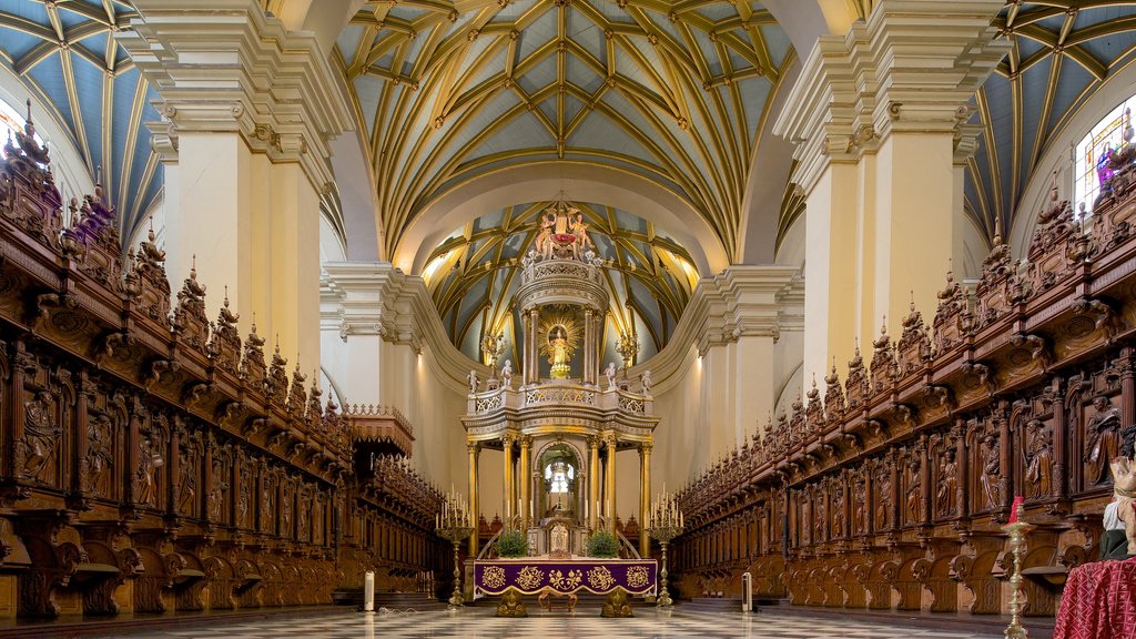 Plaza Mayor which includes a church or cathedral, religious aspects and interior views