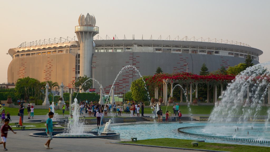 Exposition Park featuring a garden and a fountain