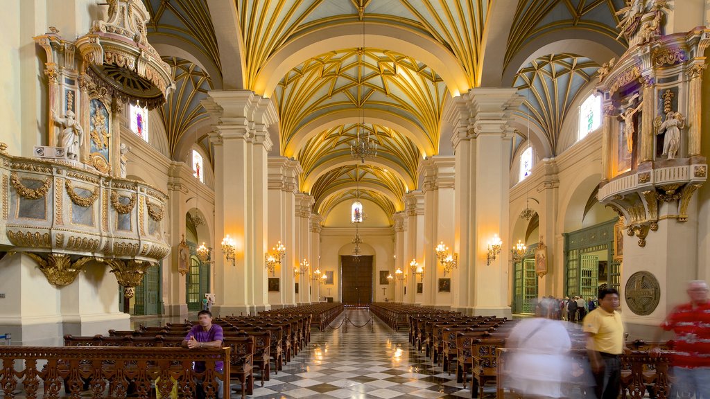 Plaza Mayor featuring a church or cathedral, interior views and religious aspects