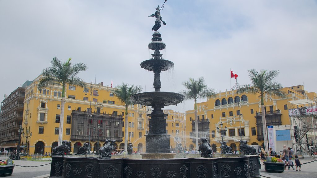 Plaza Mayor featuring a fountain and a city