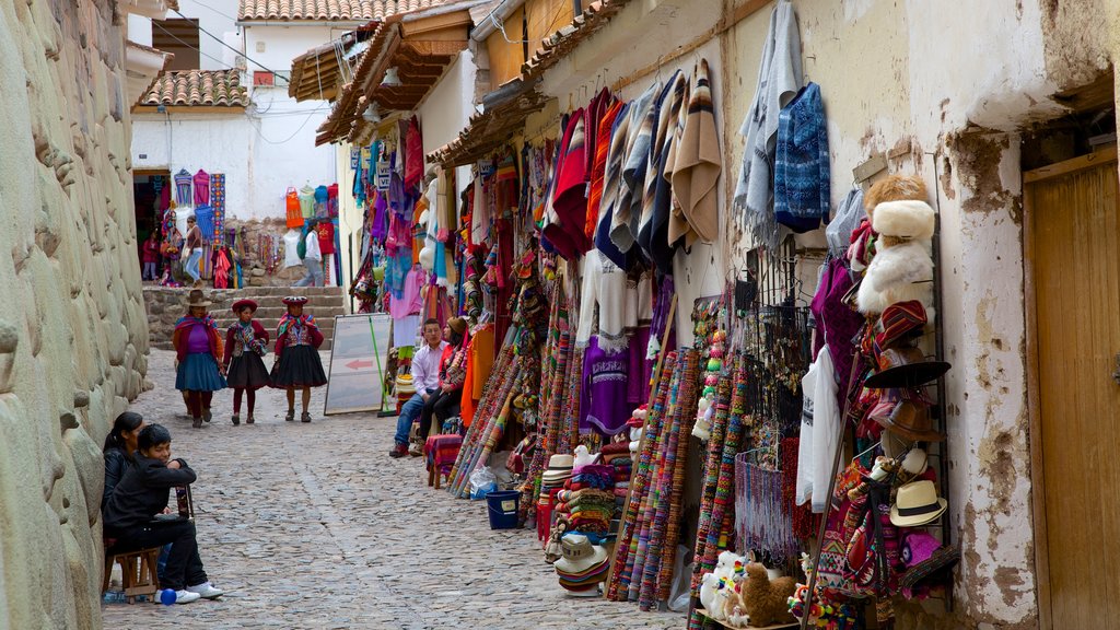 Hatunrumiyoc which includes street scenes and markets