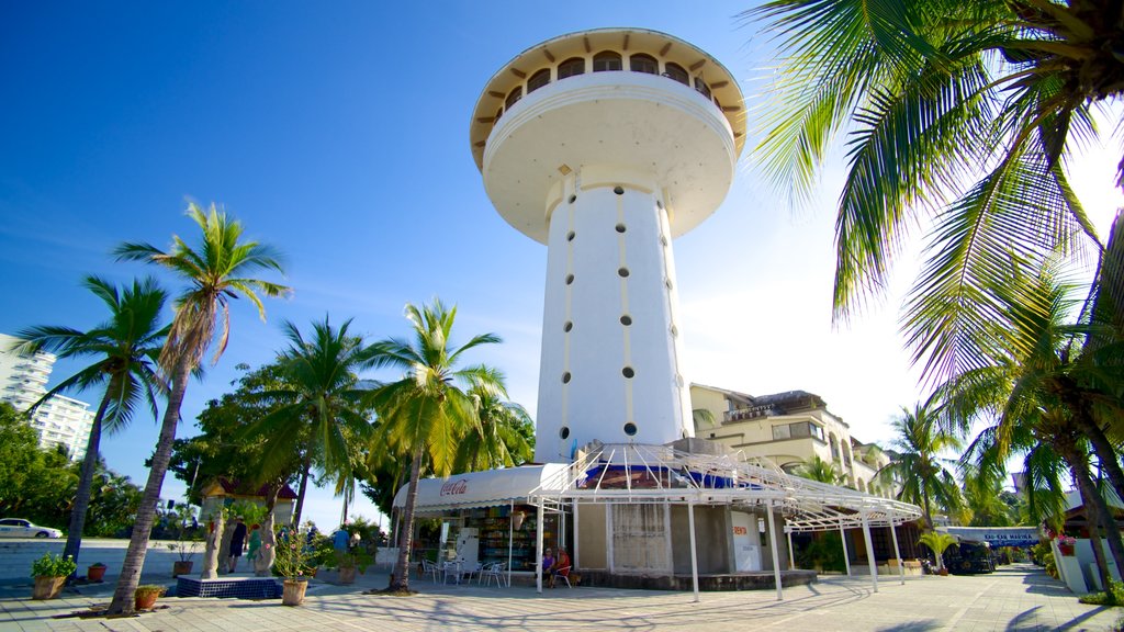 Marina Ixtapa showing tropical scenes, a city and street scenes