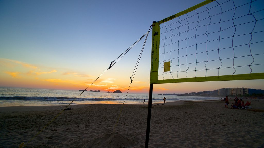 El Palmar Beach showing a sunset and a sandy beach