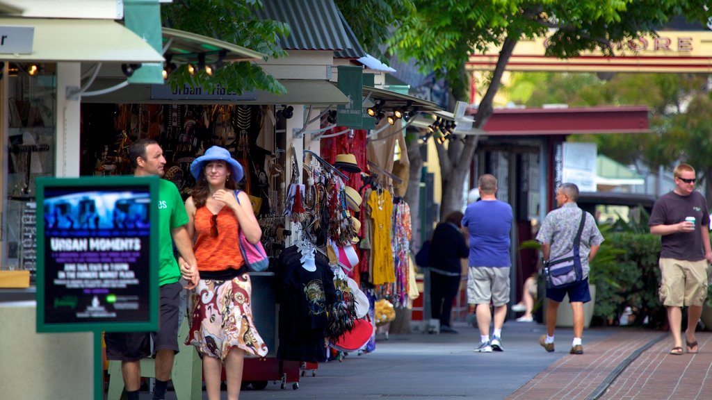 The Grove showing street scenes, a city and shopping