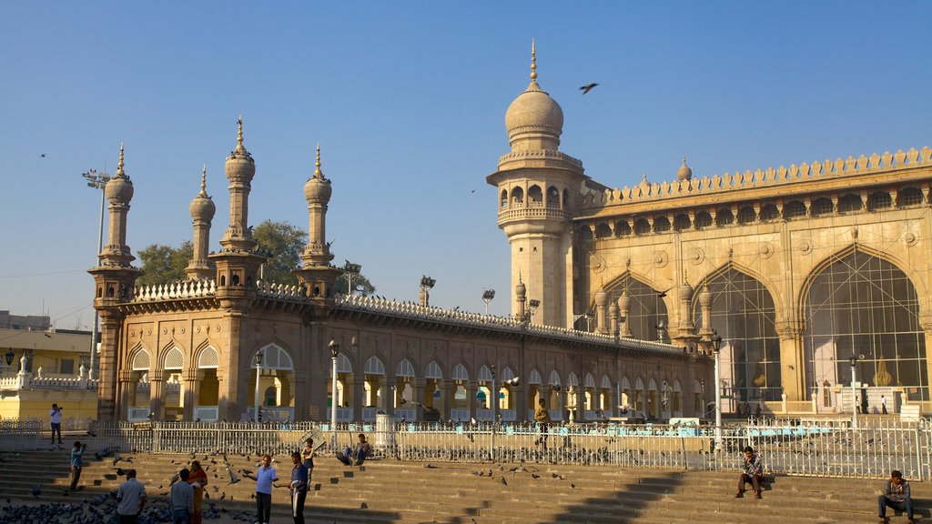 Mecca Masjid que incluye aspectos religiosos, arquitectura patrimonial y un mezquita