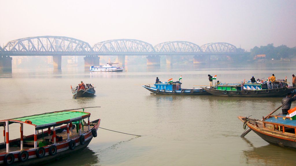 Bally Bridge which includes boating, a river or creek and mist or fog