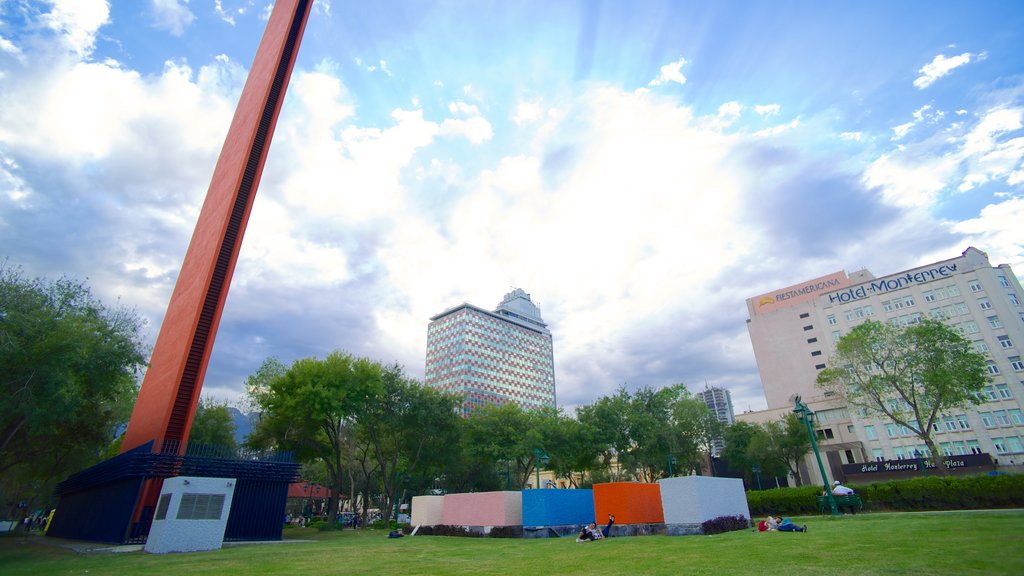 Faro de Comercio which includes modern architecture, a city and a park