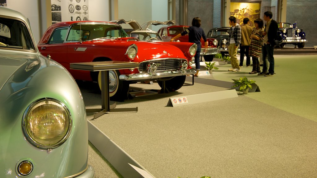 Toyota Commemorative Museum of Industry and Technology showing interior views as well as a large group of people