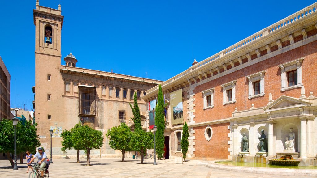 Valencia City Centre showing a city, cycling and heritage architecture