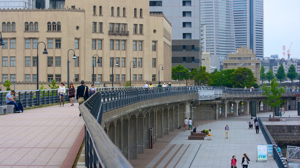 Yamashita Park featuring a bridge, street scenes and a city