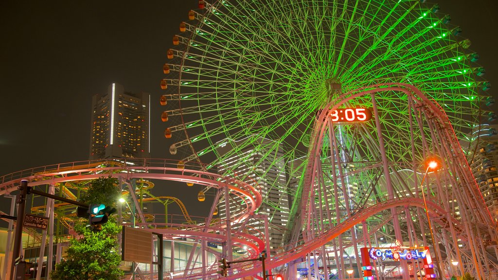 Minatomirai which includes rides, a city and modern architecture