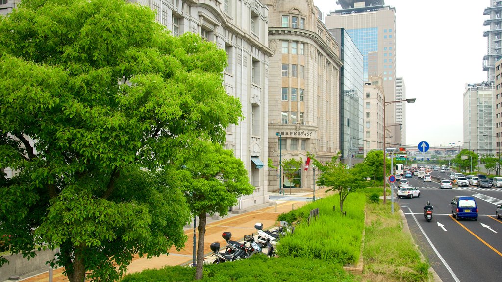 Kobe showing a city and street scenes