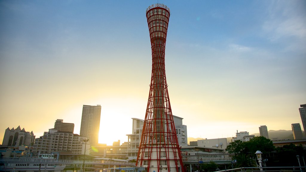 Kobe Tower which includes modern architecture, a sunset and central business district