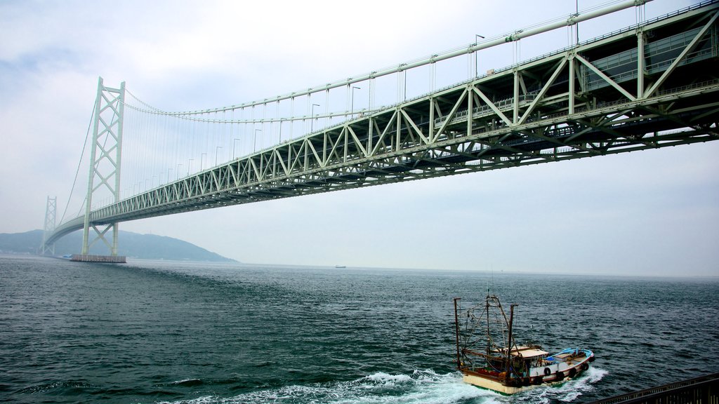 Akashi Kaikyo Bridge featuring a suspension bridge or treetop walkway, boating and general coastal views