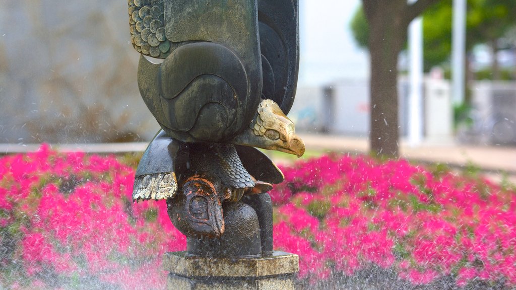 Parque Meriken que incluye un parque, arte y una estatua o escultura