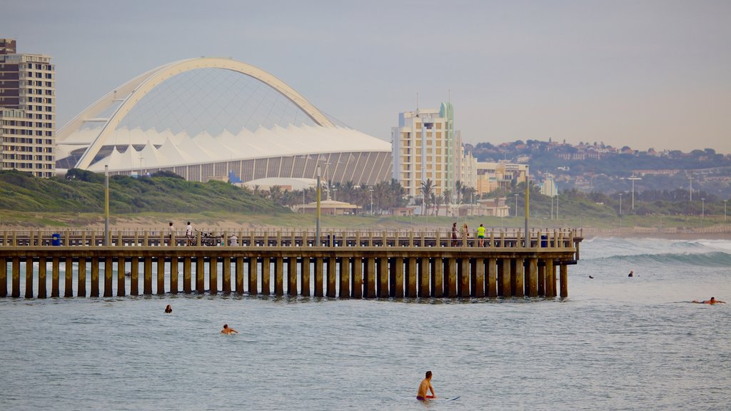 South Beach showing general coastal views, modern architecture and swimming