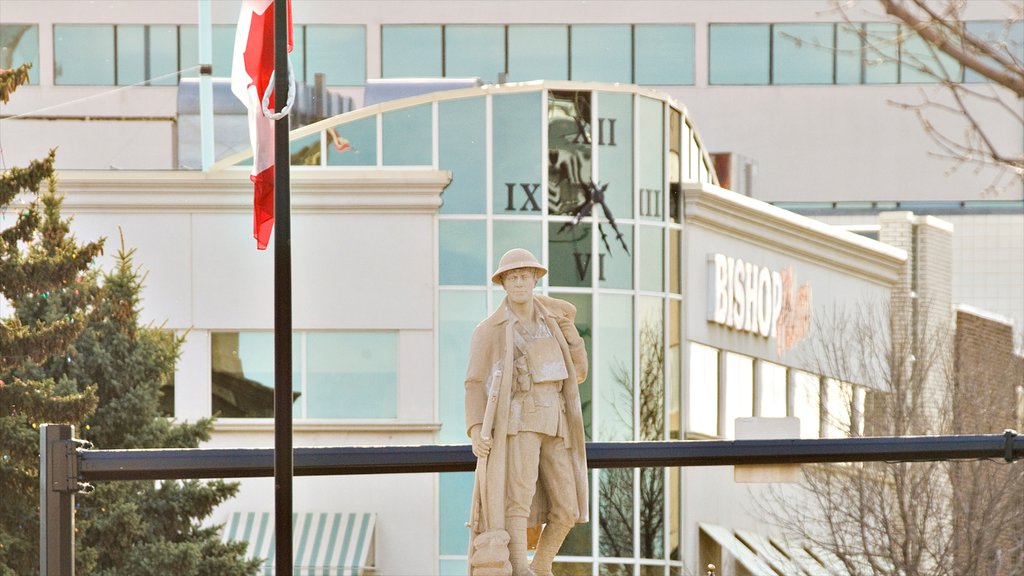 Red Deer qui includes une statue ou une sculpture, signalisation et une ville