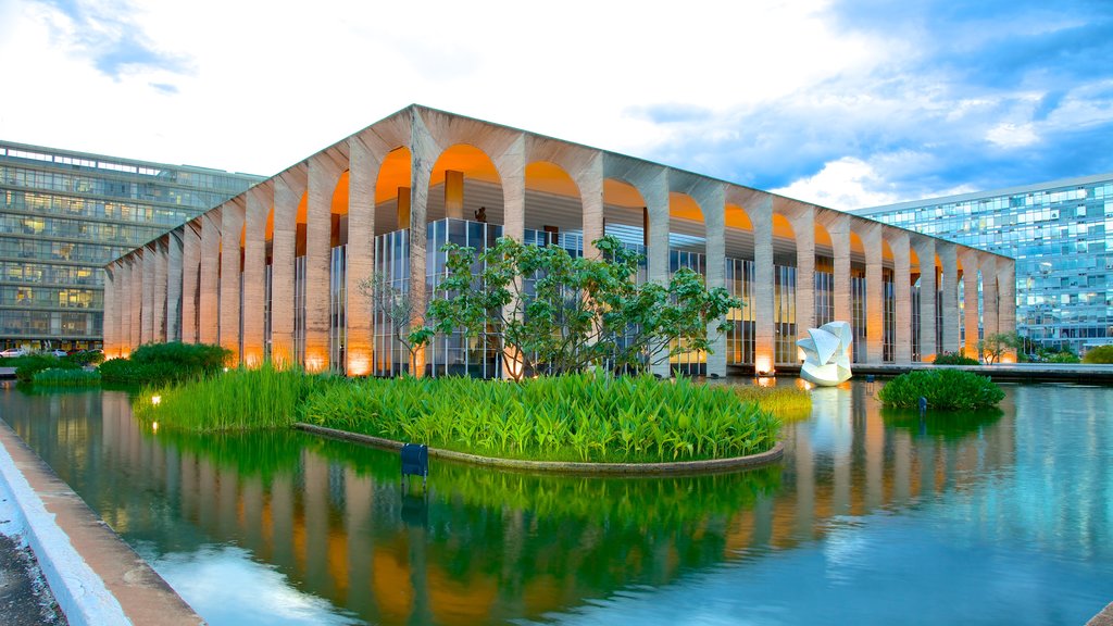 Itamaraty Palace showing modern architecture, a pond and a castle