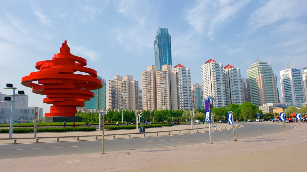 May Fourth Square showing street scenes, outdoor art and a city