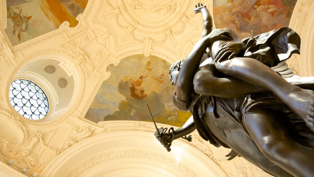 Petit Palais showing a statue or sculpture and interior views