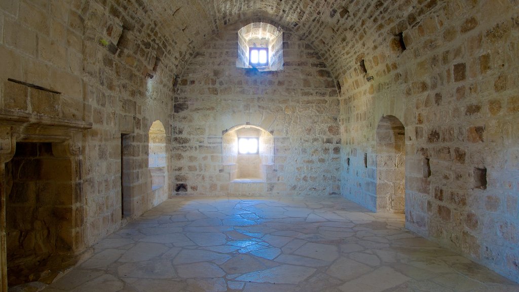 Kolossi Castle featuring interior views and heritage architecture