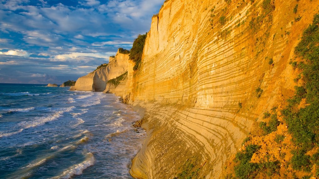 Sunset Beach which includes a sunset and rugged coastline