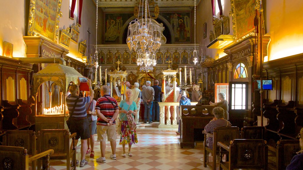 Paleokastritsa Monastery which includes heritage architecture, a church or cathedral and religious elements