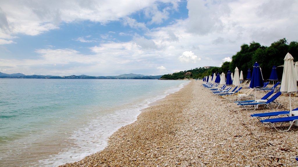 Playa de Barbati que incluye una playa de piedras, una playa de arena y vista panorámica