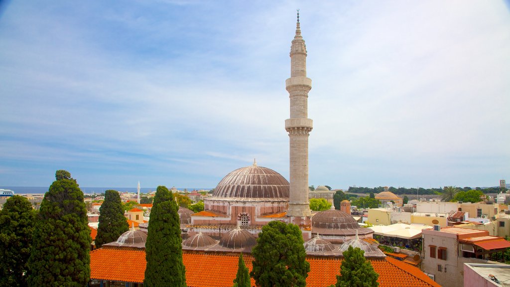 Clock Tower which includes heritage architecture, a mosque and a city