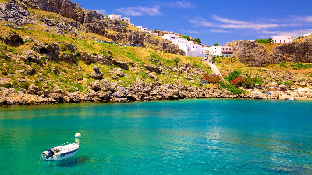 Lindos which includes rocky coastline and general coastal views