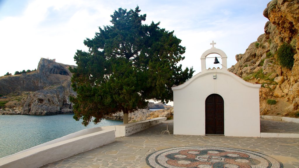 Rhodes Island which includes religious aspects, general coastal views and a church or cathedral