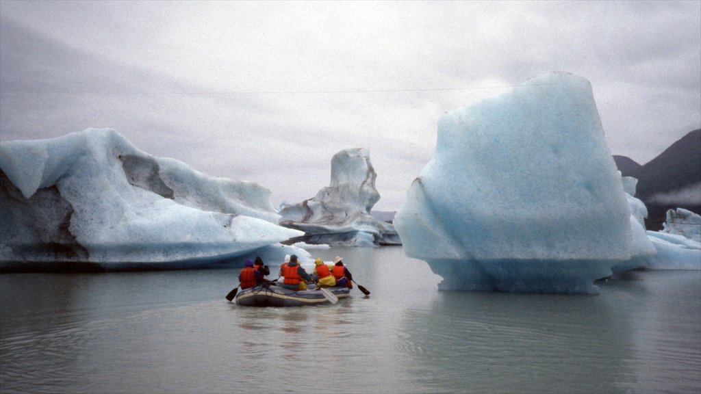 Yukon which includes snow and kayaking or canoeing as well as a small group of people