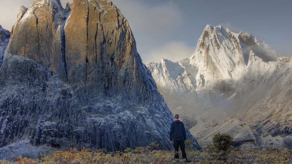 Yukon which includes mountains and snow as well as an individual male