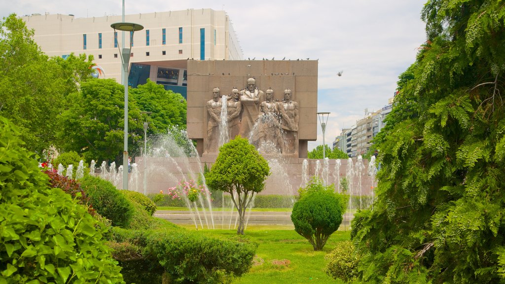 Kizilay Square featuring a statue or sculpture and a garden