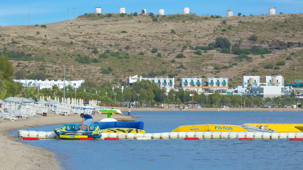 Bardakci Beach which includes a sandy beach and a coastal town